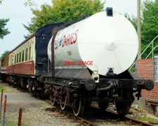 FOTO DE UM TANQUE DE LEITE DE LATICÍNIOS UNIDOS DE 6 RODAS NA PARTE TRASEIRA DE UM TREM NO MEIO NORF comprar usado FOTO DE UM TANQUE DE LEITE DE LATICÍNIOS UNIDOS DE 6 RODAS NA PARTE TRASEIRA DE UM TREM NO MEIO NORF comprar usado  Enviando para Brazil