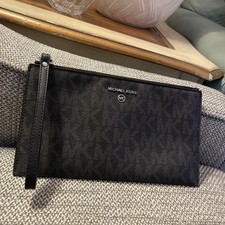 Carteira de mão Michael Kors preta/marrom jet set MK com zíper porta-cartão pulseira , usado comprar usado  Enviando para Brazil