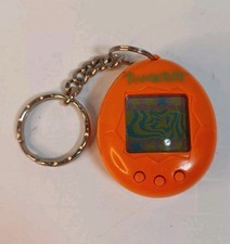 Vintage Bandai Original TamaGotchi Laranja 1997 Inglês comprar usado Vintage Bandai Original TamaGotchi Laranja 1997 Inglês comprar usado  Enviando para Brazil
