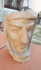 Scultura volto primo usato  San Giuliano di Puglia