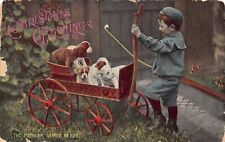 Usado, Cartão postal vintage Christmas Greetings Little Boy with Beagle Puppies Cart comprar usado  Enviando para Brazil