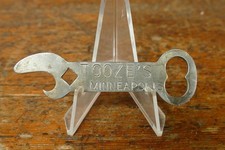 Vintage lata 1910-1920 Tooze's Minneapolis Płaski reklamowy otwieracz do butelek piwa na sprzedaż  Wysyłka do Poland