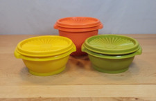Tigelas vintage TUPPERWARE #1323 e #886 tampas de vedação instantânea conjunto de 3 colheita comprar usado  Enviando para Brazil