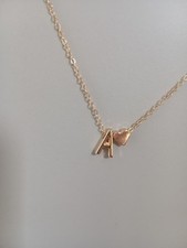 Collana lettera con usato  Usmate Velate