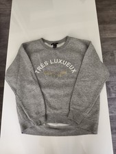 Pull gris clair d'occasion  Nilvange