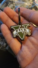 Usado, Chaveiro promocional de metal Grand Theft logotipo V automático comprar usado  Enviando para Brazil