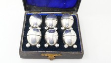 Conjunto de 6 potes de sal e pimenta em forma de ovo em pés de bola folheados a prata com caixa conjunto de seis comprar usado  Enviando para Brazil