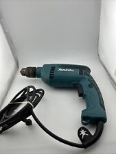 Broca elétrica Makita velocidade variável reversível plug-in azul-petróleo HP1640 aço comprar usado  Enviando para Brazil