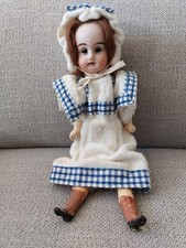Ancienne mignonnette poupée d'occasion  La Fouillade