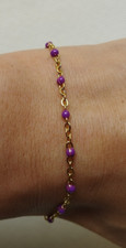 Bracelet femme doré d'occasion  Saint-Maur-des-Fossés