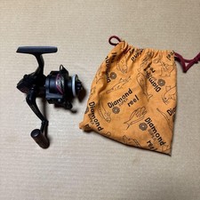 Carretel Diamond Caliber SS 4000 Spincast relação de engrenagem 7.1:1 com bolsa laranja, usado comprar usado  Enviando para Brazil