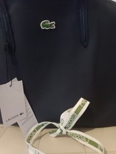 Sac lacoste zippé d'occasion  La Rochelle