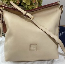 Dooney bourke bone d'occasion  Expédié en Belgium