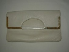 Pochette femme cuir d'occasion  Le Péage-de-Roussillon