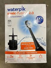 Cepillo de dientes eléctrico profesional Waterpik Sonic-Fusion 2.0 y hilo dental de agua segunda mano  Embacar hacia Mexico
