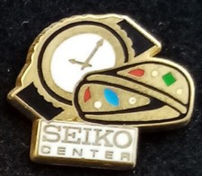 Pin badge montre d'occasion  Mandelieu-la-Napoule