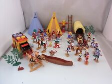 Usado, Bonecos e acessórios antigos de tenda de canoa carrinho de cavalos caubói indiano Playmobil comprar usado  Enviando para Brazil