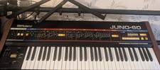 Roland juno synthesiser for sale  BURY