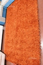 Tappeto arancione con usato  Susegana