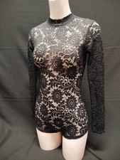 Tutina body fiori usato Tutina body fiori usato  Italia