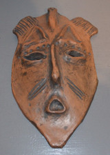 Masque mural terre d'occasion Masque mural terre d'occasion  Pont-Évêque