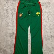 Zielono-czerwone spodnie dresowe Puma Kamerun Puma piłka nożna odzież sportowa na sprzedaż  PL