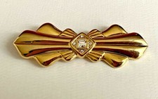 Broche vintage doré d'occasion  Paris XV