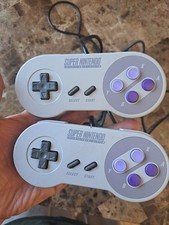 Usado, 2 controles oficiais originais autênticos originais do fabricante de equipamento original Super Nintendo SNES funcionando lote A comprar usado Usado, 2 controles oficiais originais autênticos originais do fabricante de equipamento original Super Nintendo SNES funcionando lote A comprar usado  Enviando para Brazil