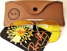 Óculos amarelo calicromo vintage B&L Ray Ban EUA furo de bala 62mm anos 70 comprar usado Óculos amarelo calicromo vintage B&L Ray Ban EUA furo de bala 62mm anos 70 comprar usado  Enviando para Brazil