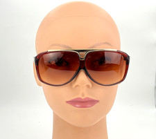 Óculos de sol Louis Vuitton Evidence masculino oversized – armação marrom com monograma dourado comprar usado Óculos de sol Louis Vuitton Evidence masculino oversized – armação marrom com monograma dourado comprar usado  Enviando para Brazil