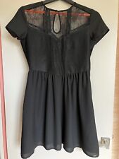 Robe noire ikks d'occasion  Savigné-l'Évêque