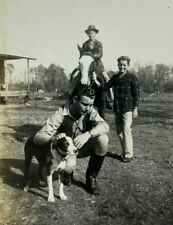 Man kneeling dog for sale  Foley