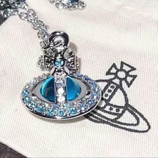 Collier orbe minuscule d'occasion  Expédié en France