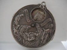 Medalla giratoria. Metal niquelado. Toledo. El Greco. 1970 Alto relieve. Escenas comprar usado  Enviando para Brazil