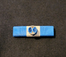Rappel ruban rosette d'occasion  Chinon