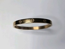 Gold plated love for sale  LONDON