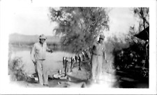 Fishermen showing fish for sale  Downey