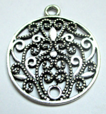 Ancien pendentif rond d'occasion  Perros-Guirec