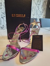 Silla sandalo fucsia usato  Roma