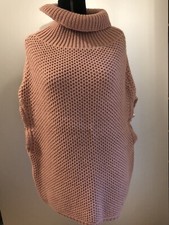 Poncho rosa con usato Poncho rosa con usato  Bologna