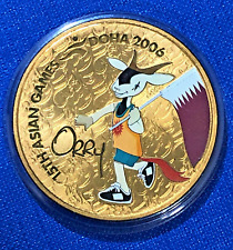 DOHA 2006 -15º Jogos Asiáticos 1Riyal MOEDA ORRY MASCOTE COM BANDEIRA, usado comprar usado  Enviando para Brazil