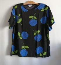 Blouse noire fleurs d'occasion  Bourg-de-Thizy