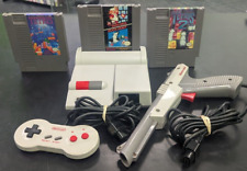 Consola Nintendo NES-101 Top Loader - Controlador Dog Bone - Pistola Zapper - + más segunda mano  Embacar hacia Argentina