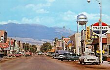 Cartão postal Main Street carros antigos Chevrolet Conoco Green Market Townsend Montana, usado comprar usado  Enviando para Brazil