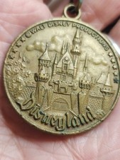 Lembrança vintage fob/medalha/chaveiro parque Disneyland comprar usado  Enviando para Brazil