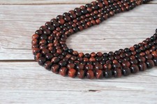 Perles oeil tigre d'occasion  Auxonne