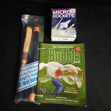 Livro de bolhas com varinha e kit de micro foguetes, usado comprar usado  Enviando para Brazil