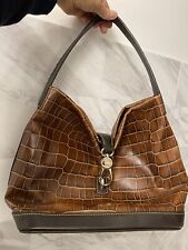 Dooney bourke brown d'occasion  Expédié en Belgium