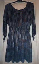 Festive robe pailletée d'occasion Festive robe pailletée d'occasion  Paris V