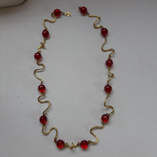Long collier rouge d'occasion  Boulogne-Billancourt